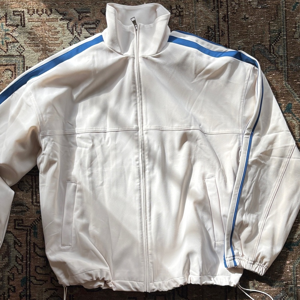 Athleta White Bomber Jacket with Blue Shoulder Stripes